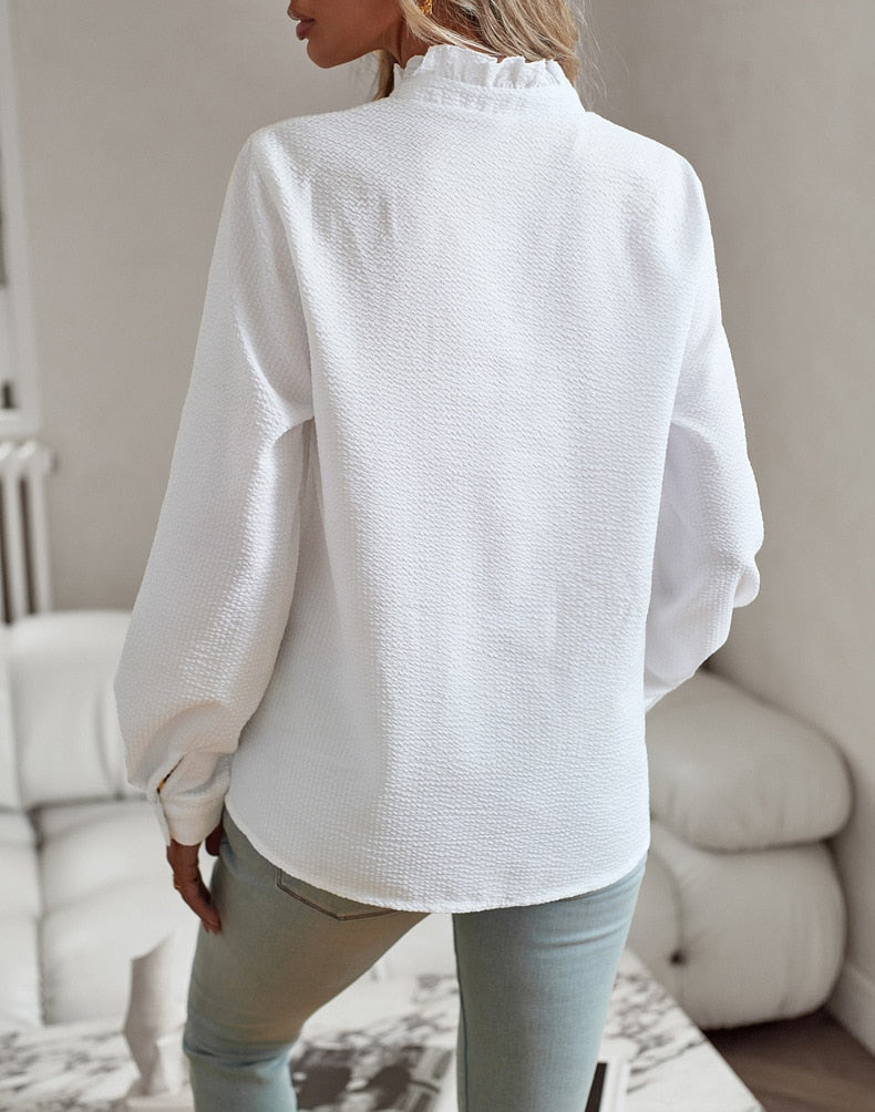 Ruffled button-up blouse for women