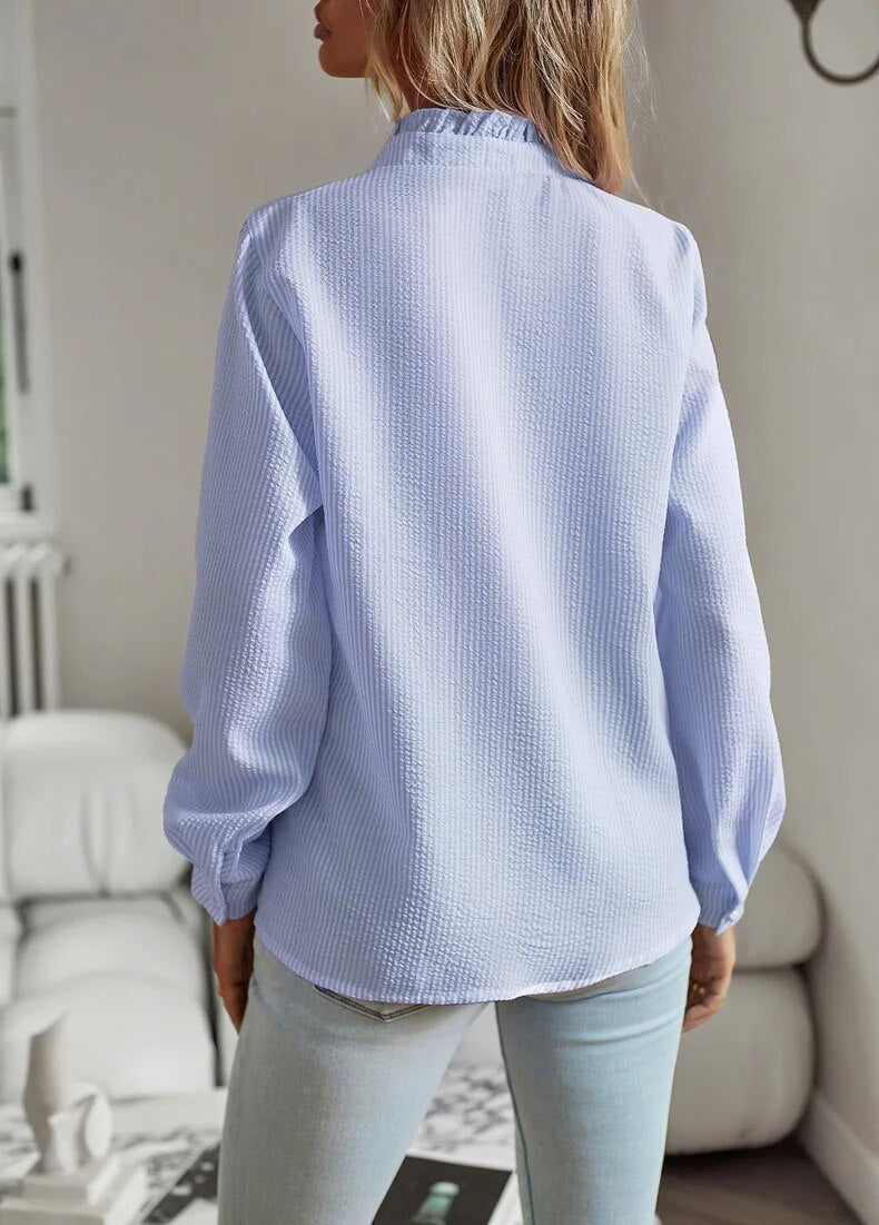 Ruffled button-up blouse for women