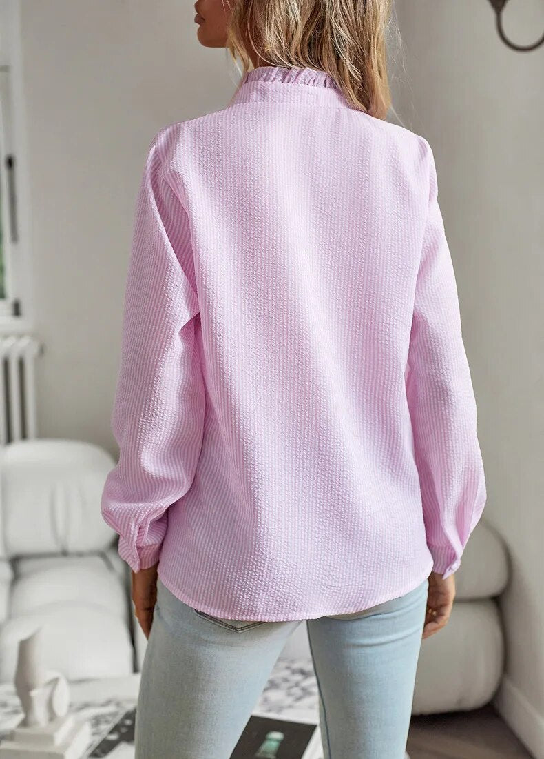 Ruffled button-up blouse for women